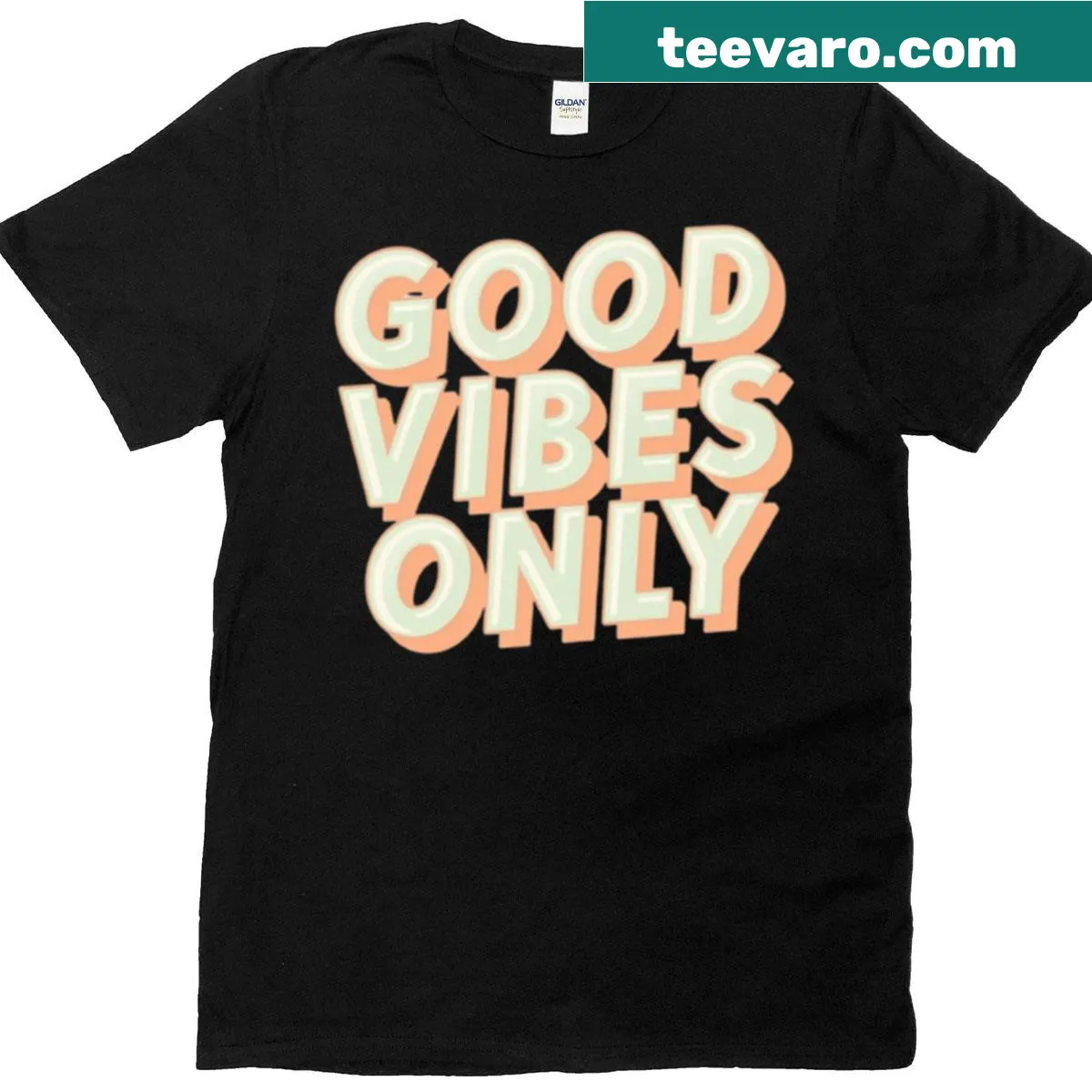 Good Vibes Only T-shirt with pastel retro typography — on a men's t-shirt