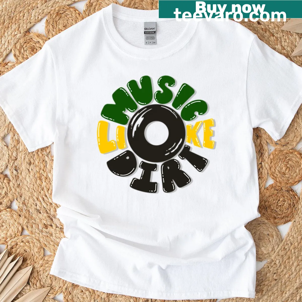 Typographic T-shirt with the phrase Music Like Dirt — on a men's t-shirt