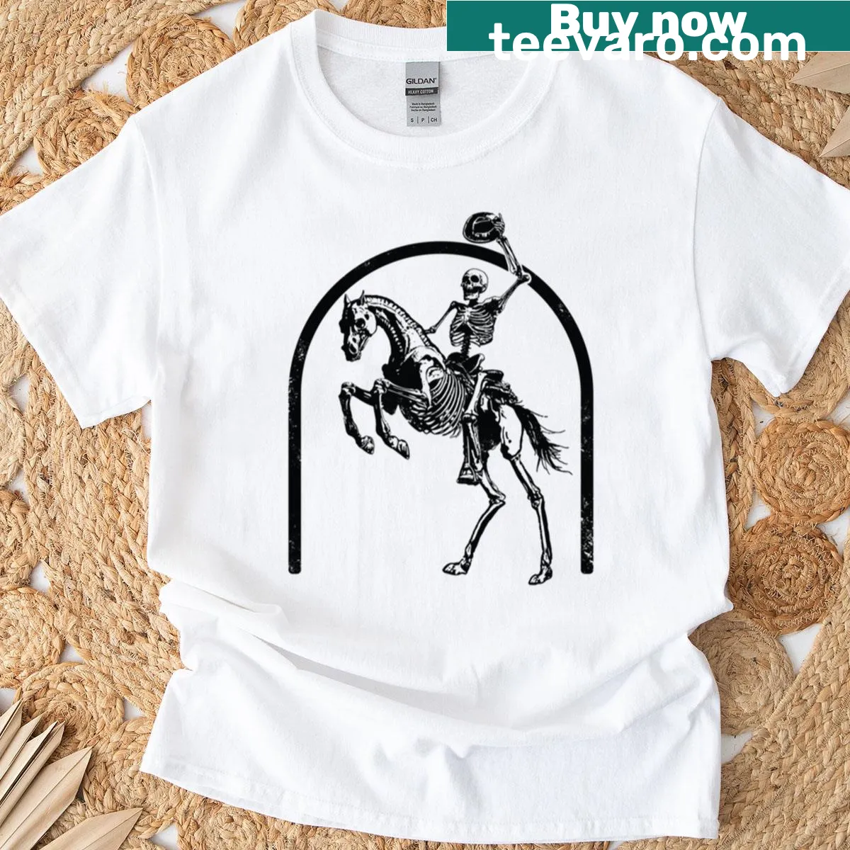 Halloween T-shirt with playful skeleton cowboy illustration — on a men's t-shirt