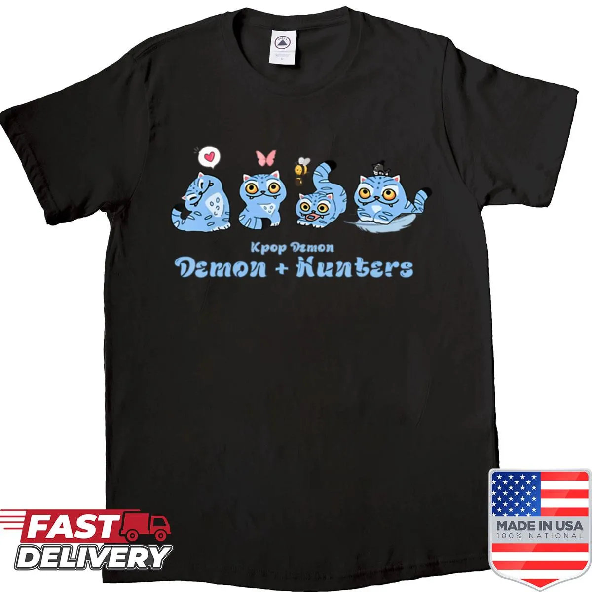 Cartoon blue cat graphic with music and movie theme on a boxy shirt