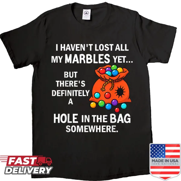 Funny shirt with the phrase I Havent Lost All My Marbles Yet
