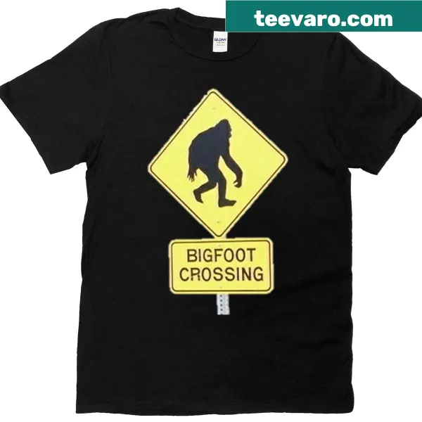 T-shirt featuring a cartoon Bigfoot crossing a street in Americana style