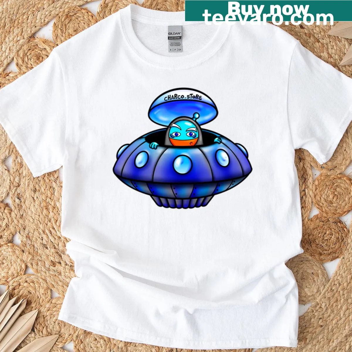 Cartoon T-shirt featuring a cute alien in a UFO — on a men's t-shirt