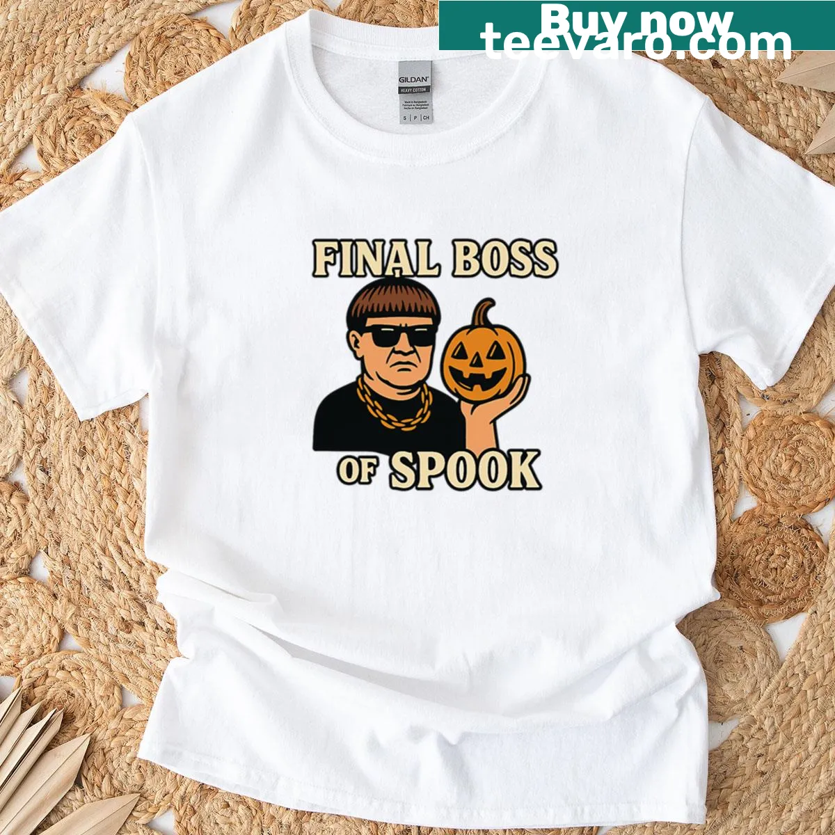Graphic T-shirt with a spooky design declaring 'Final Boss Of Spook.' — on a men's t-shirt