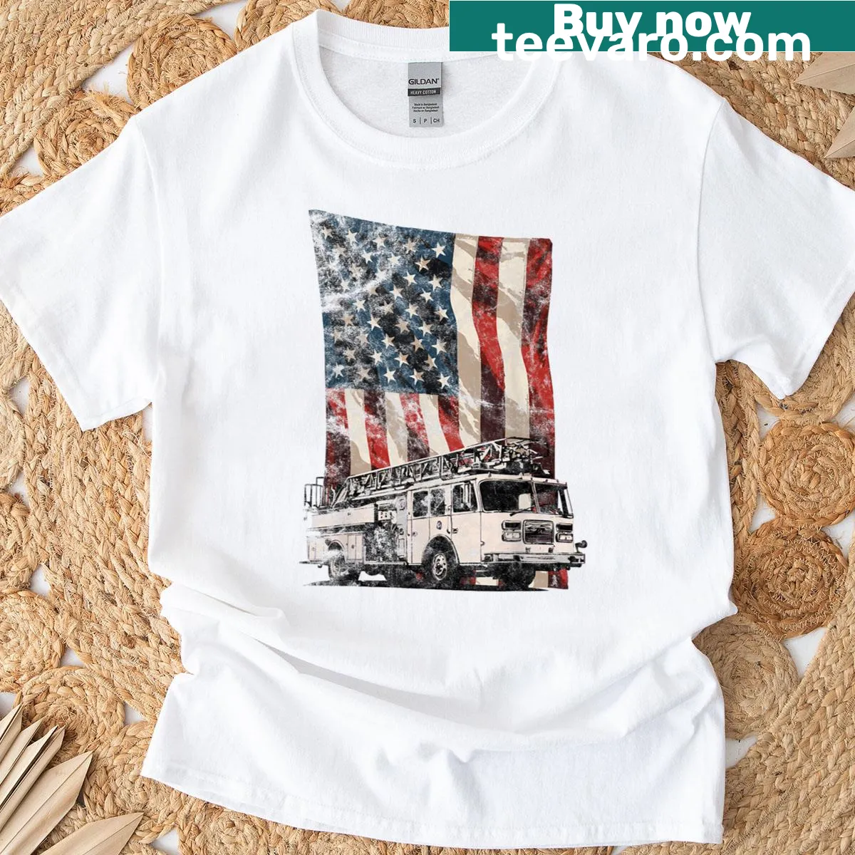 Firefighter t-shirt featuring a fire truck and American flag illustration — on a men's t-shirt