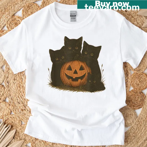 Halloween T-shirt featuring cute cats in pumpkin outfits