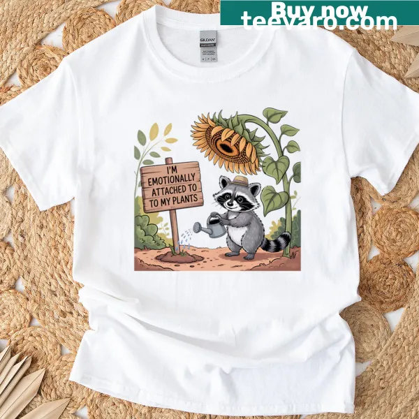 Whimsical raccoon graphic with the phrase about plants on a T-shirt