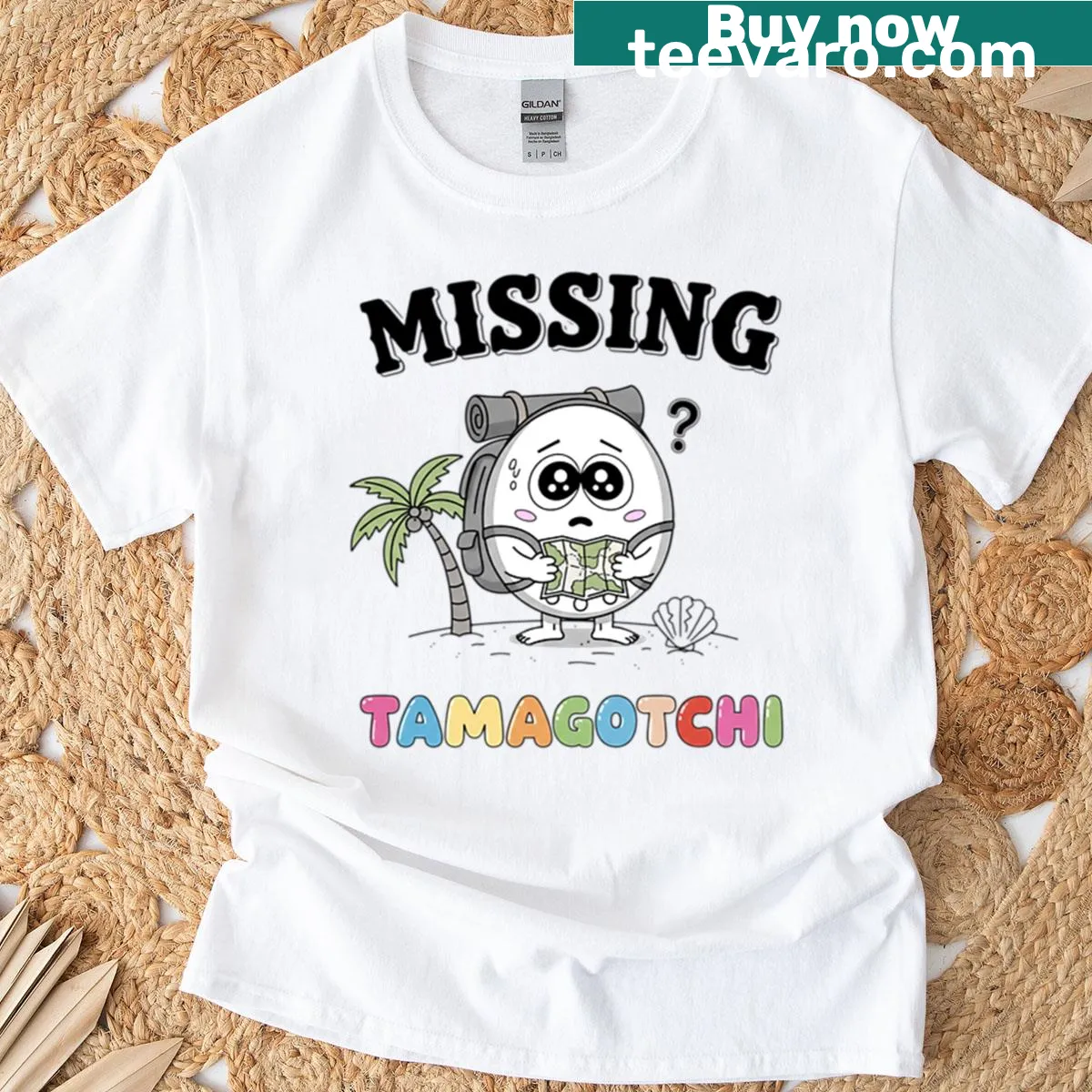 Retro Tamagotchi graphic on nostalgic 90s toy t-shirt — on a men's t-shirt