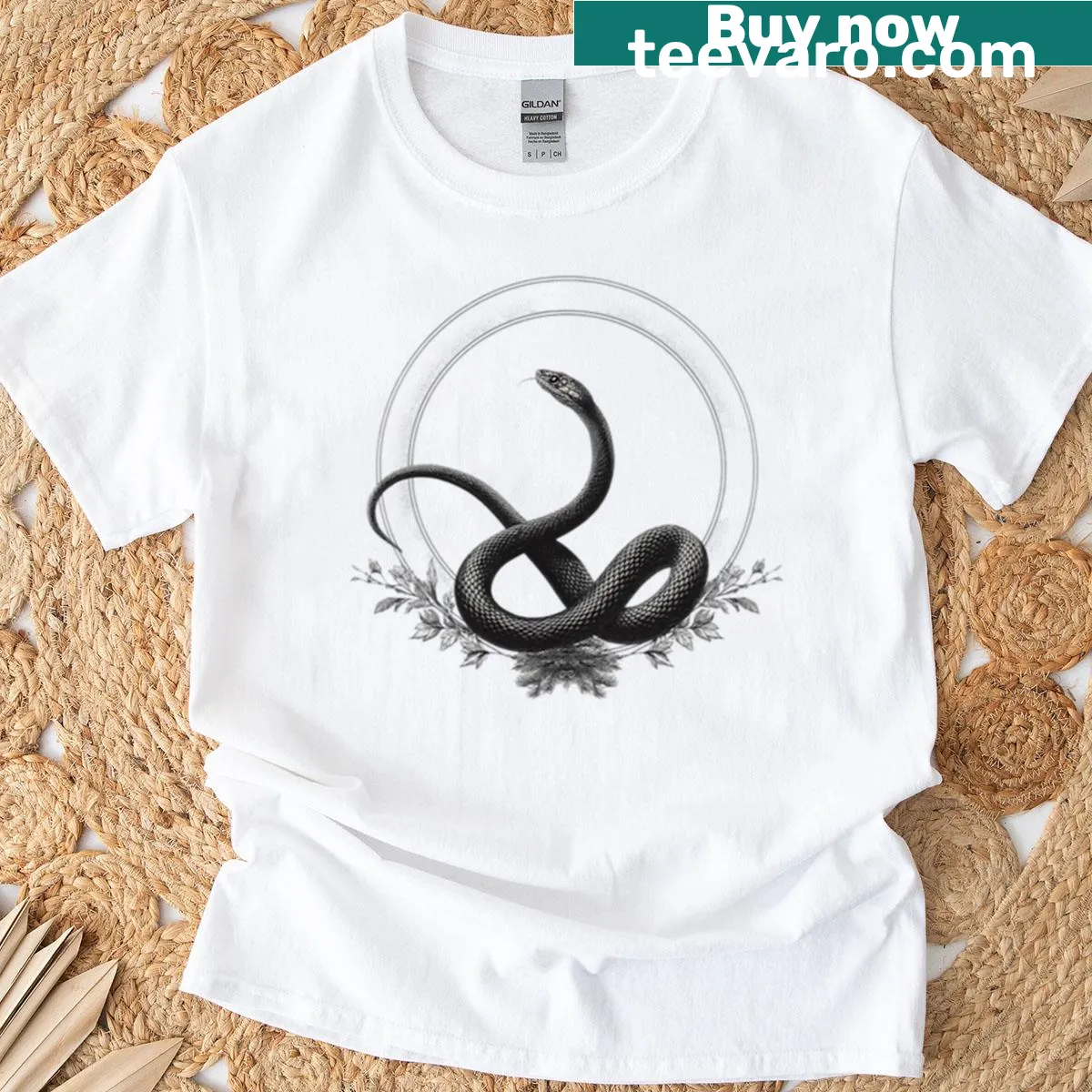 T-shirt featuring a mystical snake design with floral and moon accents — on a men's t-shirt