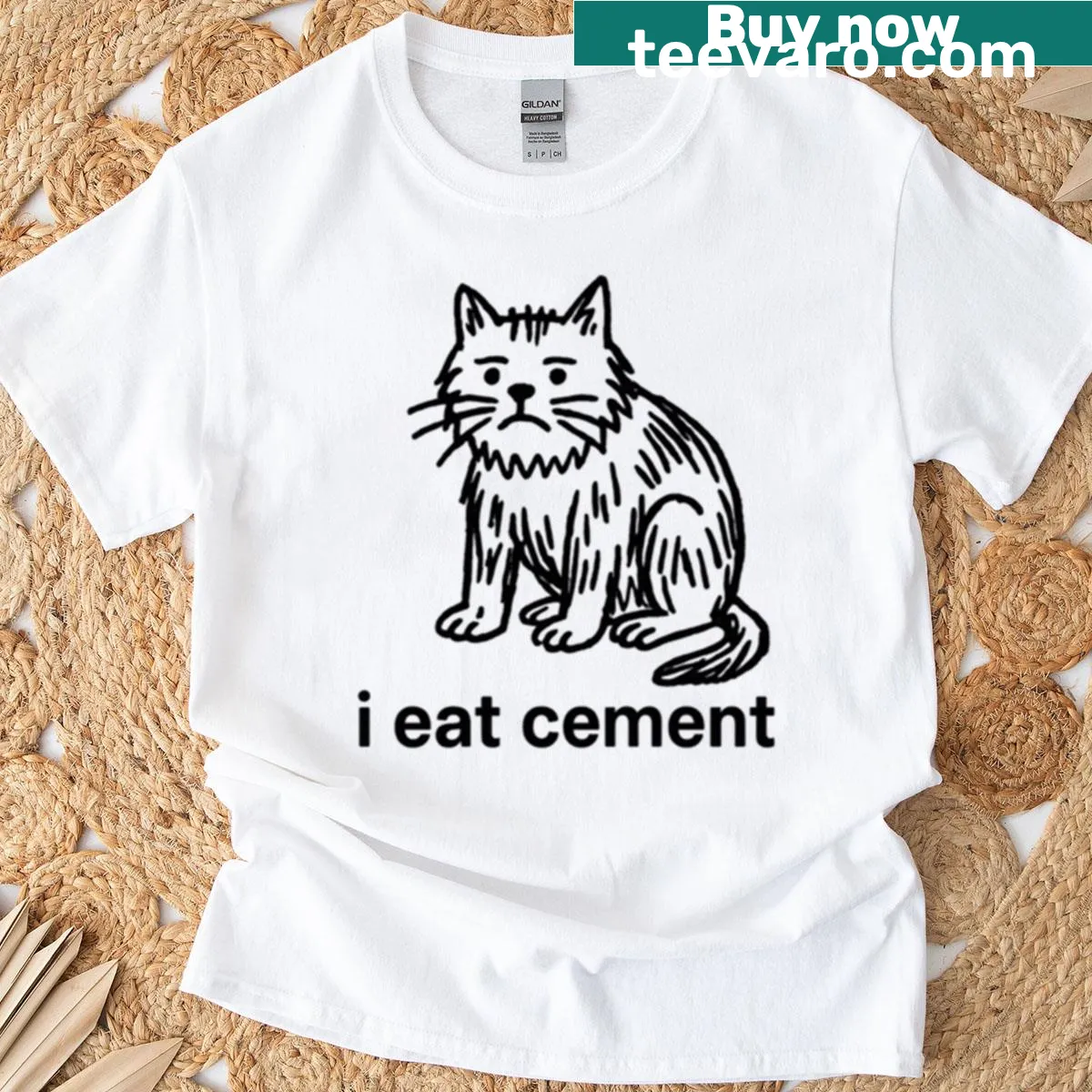 Oversized t-shirt featuring a sad cement cat illustration — on a men's t-shirt