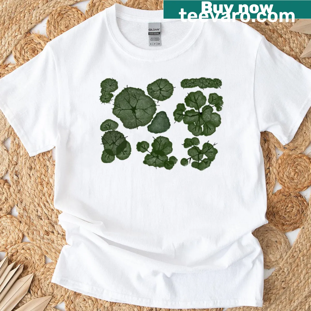 Minimalist t-shirt featuring top-down silhouette of foliage — on a men's t-shirt