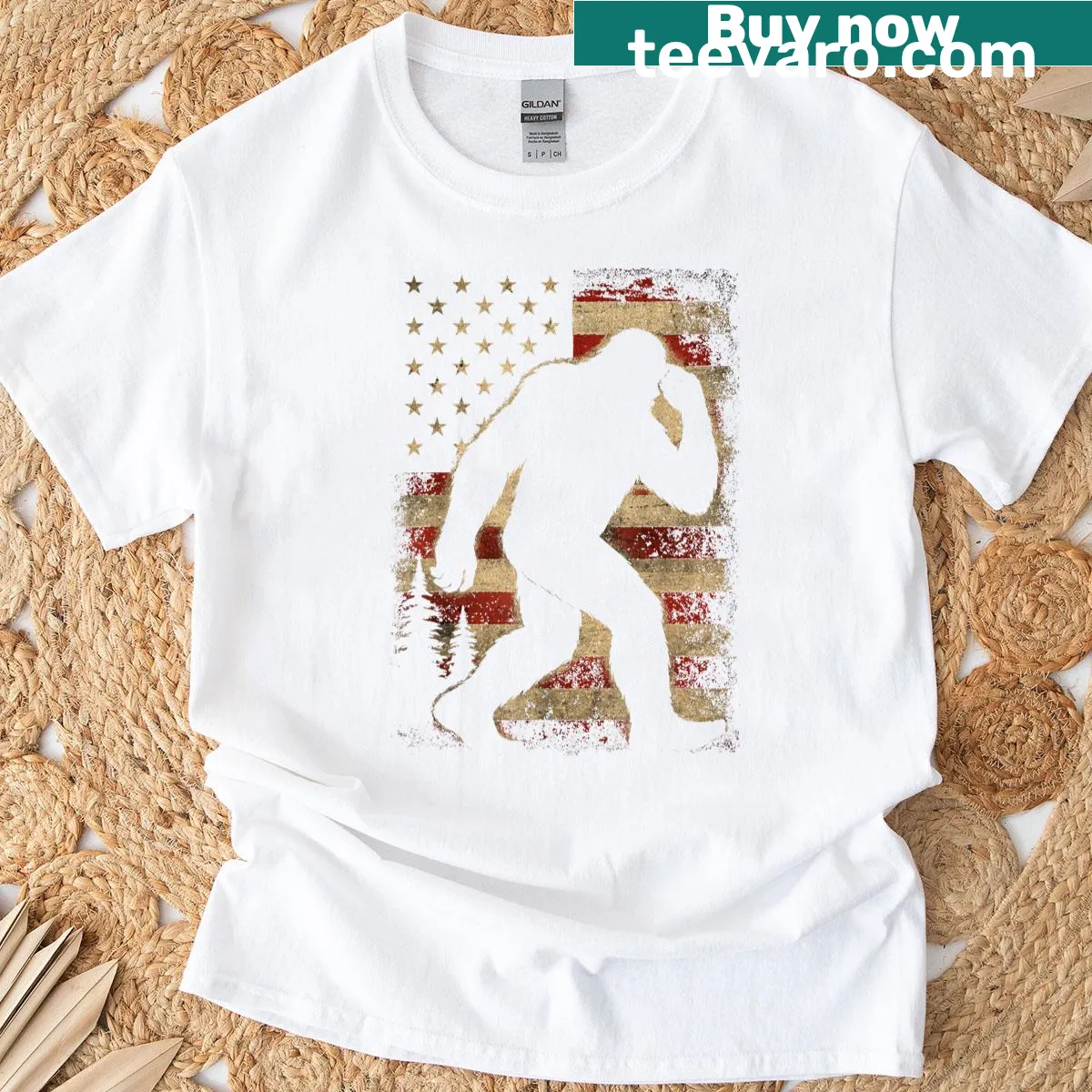 Vintage Sasquatch T-shirt featuring a Bigfoot silhouette and USA flag — on a men's t-shirt