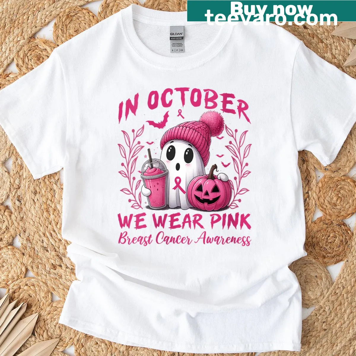 Shirt featuring the phrase 'In October We Wear Pink' with witch graphics. — on a men's t-shirt