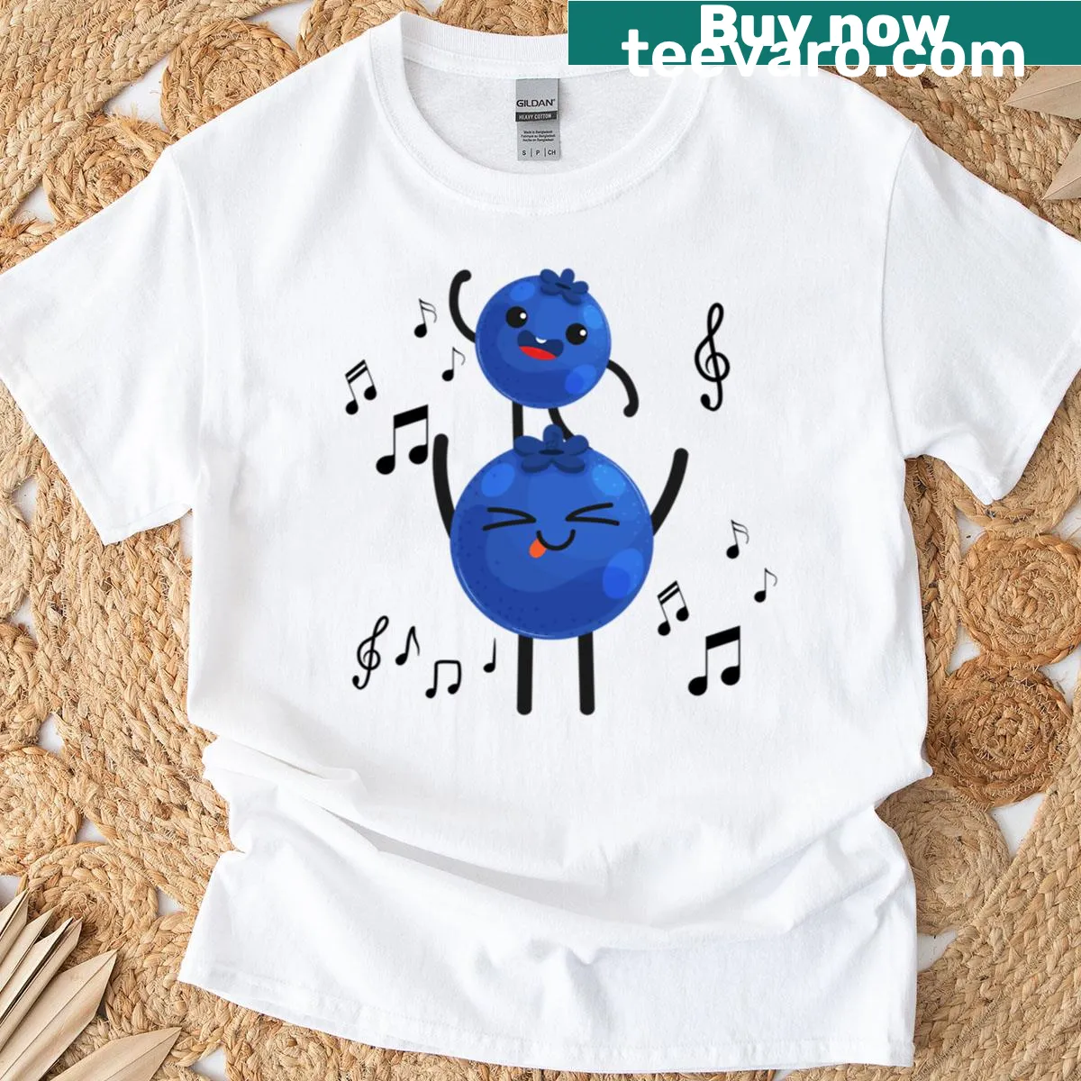 Cartoon T-shirt featuring dancing blueberries with happy expressions and musical notes. — on a men's t-shirt