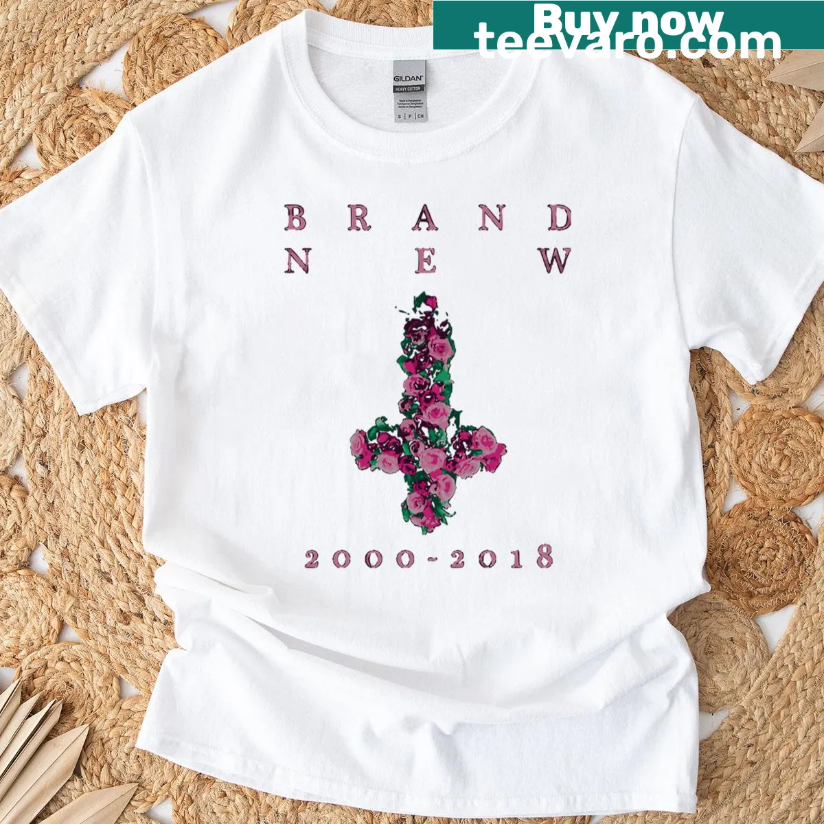 Minimalist tribute to Brand New featuring a cross graphic on a T-shirt. — on a men's t-shirt