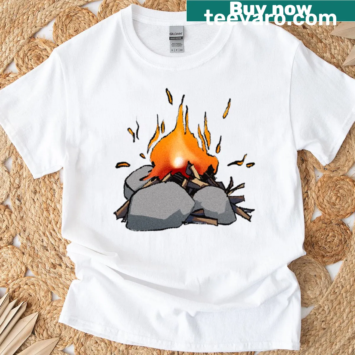 T-shirt featuring a cozy campfire scene illustration — on a men's t-shirt