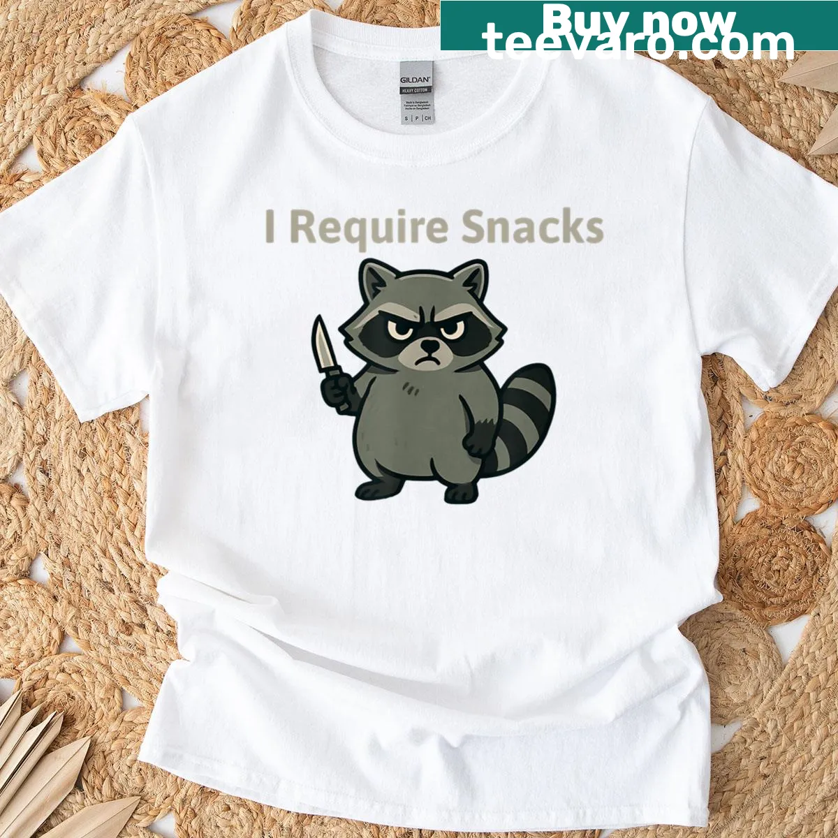 T-shirt with a cartoon raccoon graphic demanding snacks — on a men's t-shirt