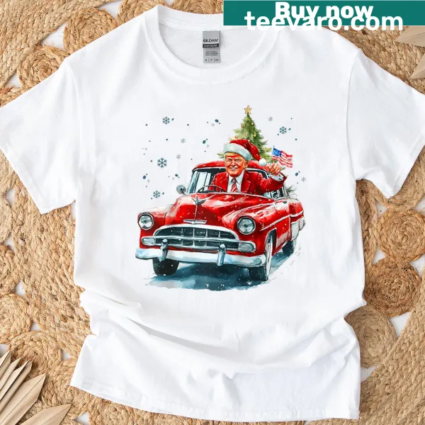 Santa Trump in a red truck for Christmas printed on a raglan tee