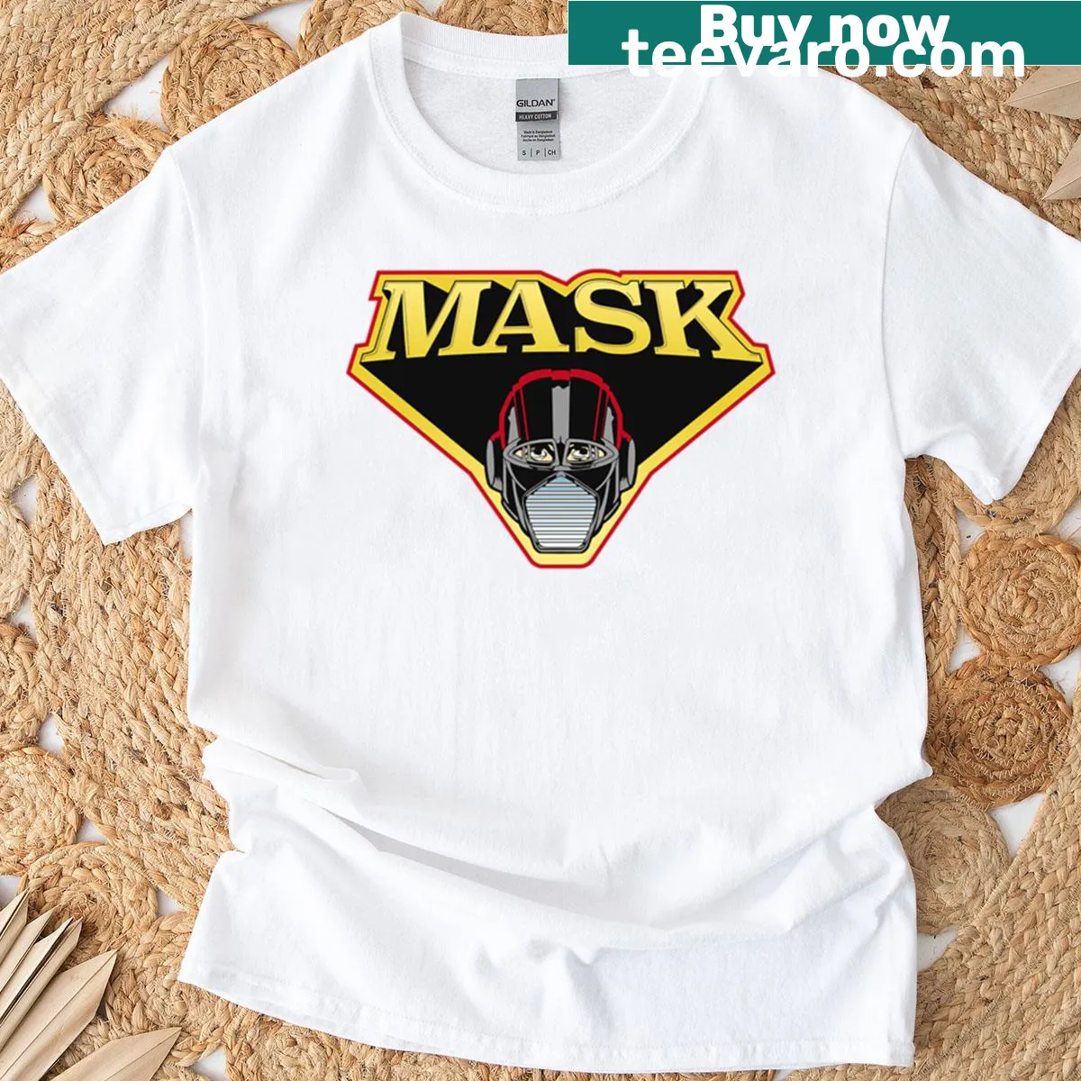 Stylized mask graphic on a minimalist logo t-shirt. — on a men's t-shirt