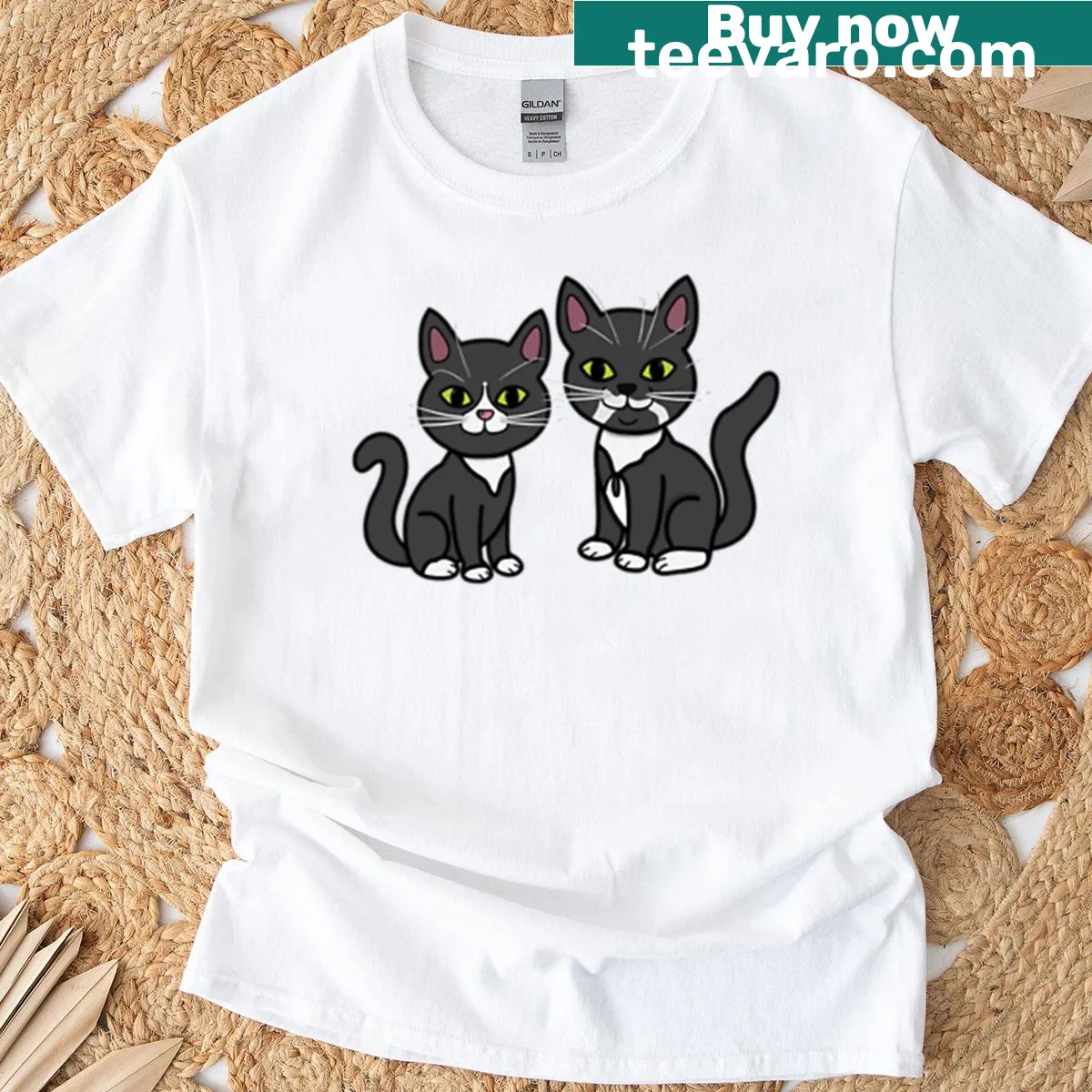 T-shirt featuring an illustration of two cats — on a men's t-shirt
