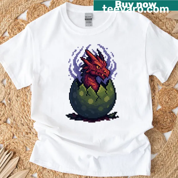 T-shirt with an illustration of a cracked open mystical pixel dragon egg