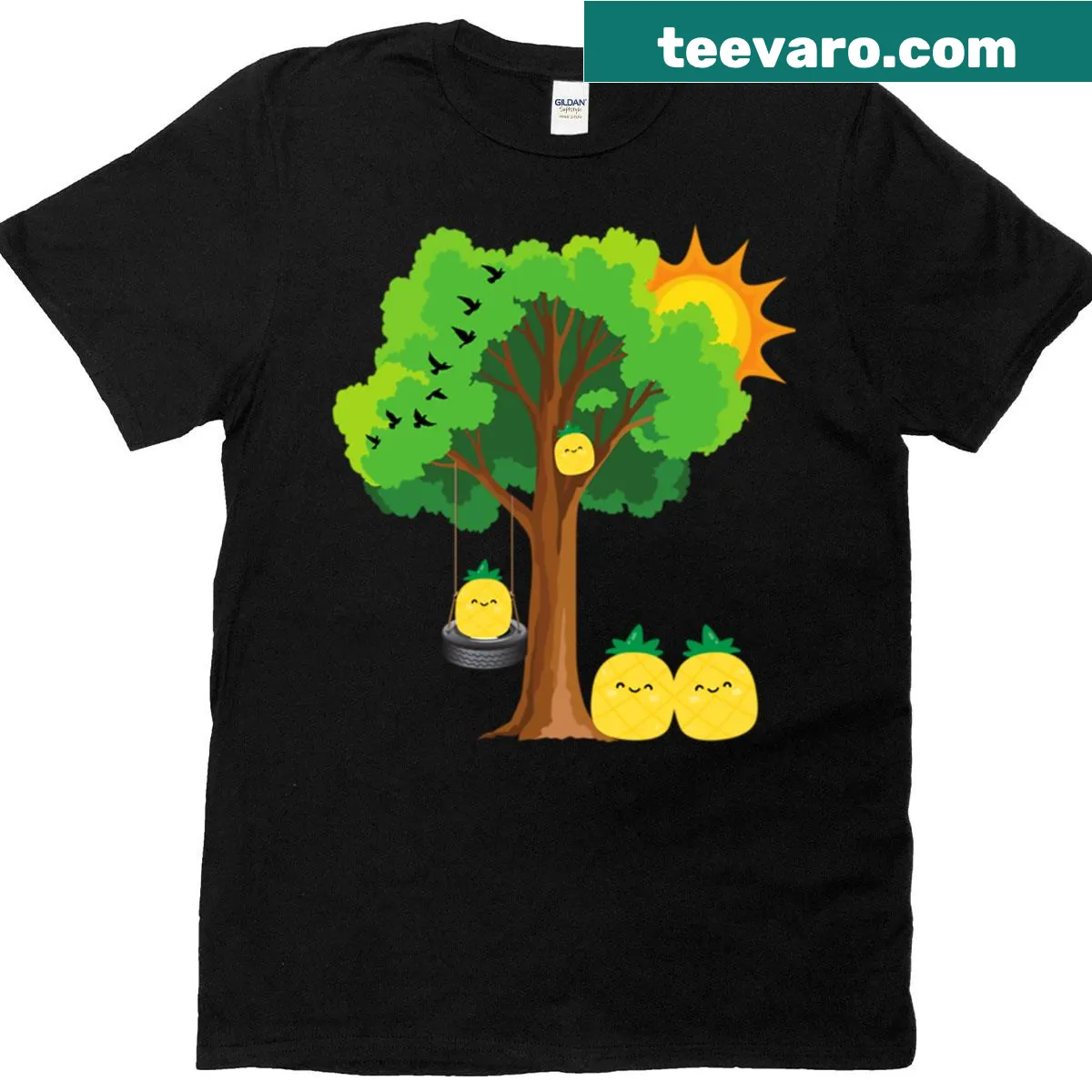 Whimsical T-shirt with illustrated pineapples playing under a tree — on a men's t-shirt