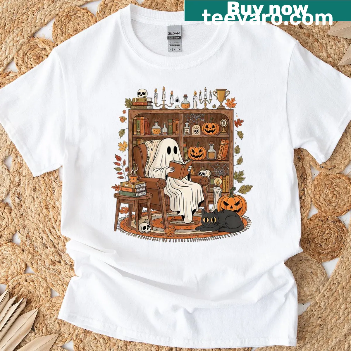 Retro Halloween t-shirt featuring a cozy ghost reading a book — on a men's t-shirt