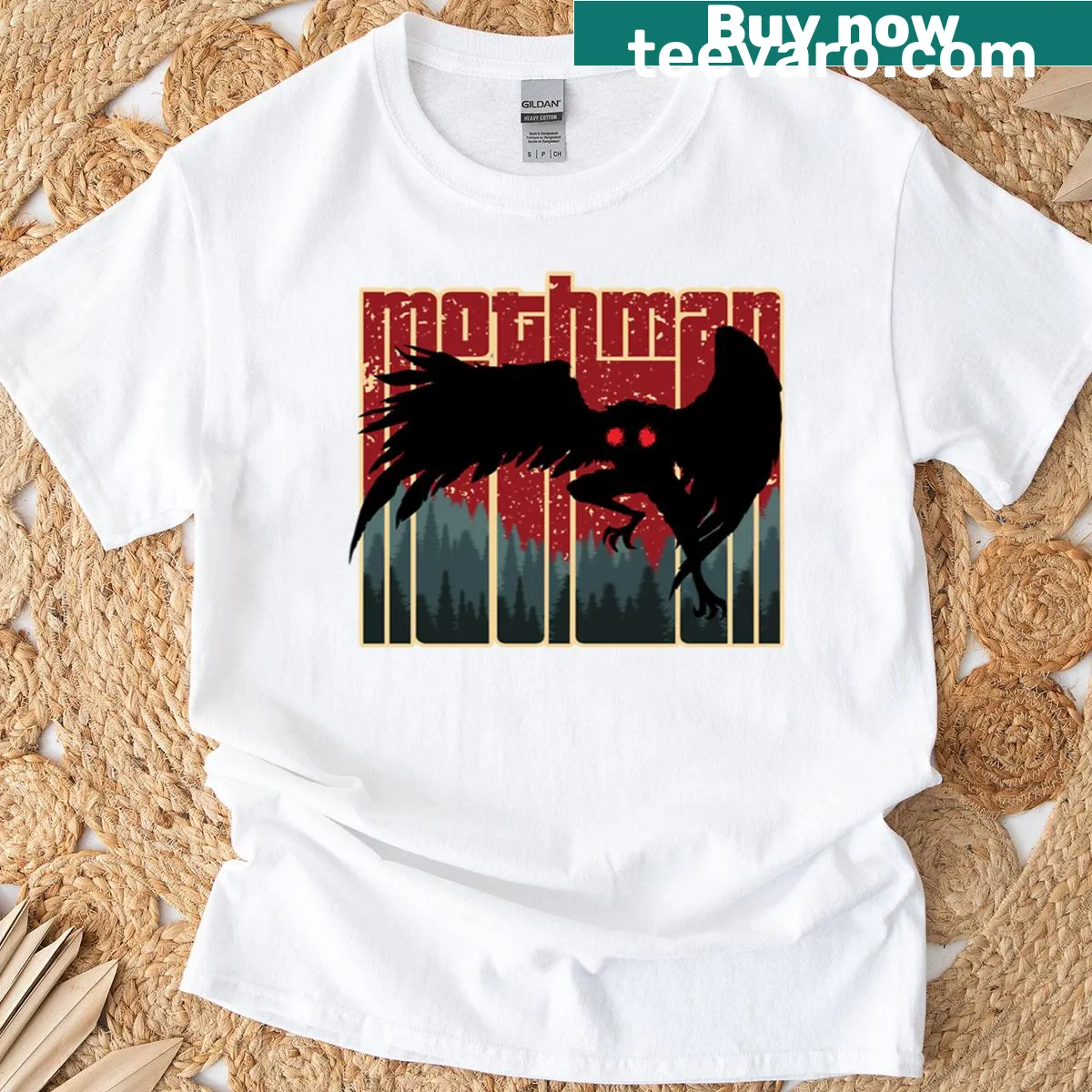 T-shirt featuring a vintage cartoon of Mothman, a famous cryptid. — on a men's t-shirt