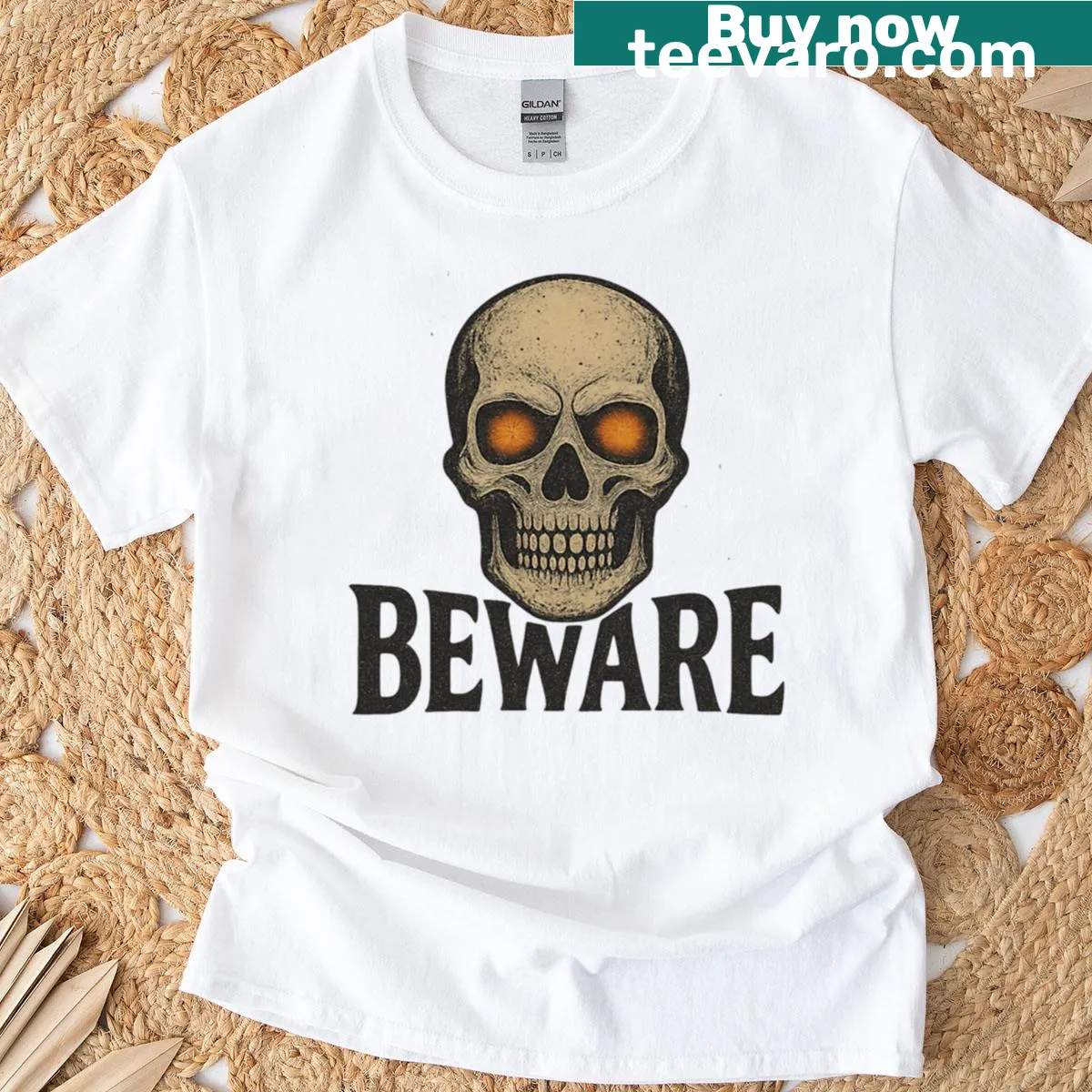 Graphic t-shirt featuring a detailed skeleton skull and 'Beware' text. — on a men's t-shirt