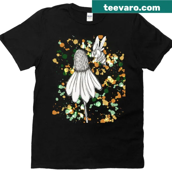 Playful splatter bee design on a T-shirt