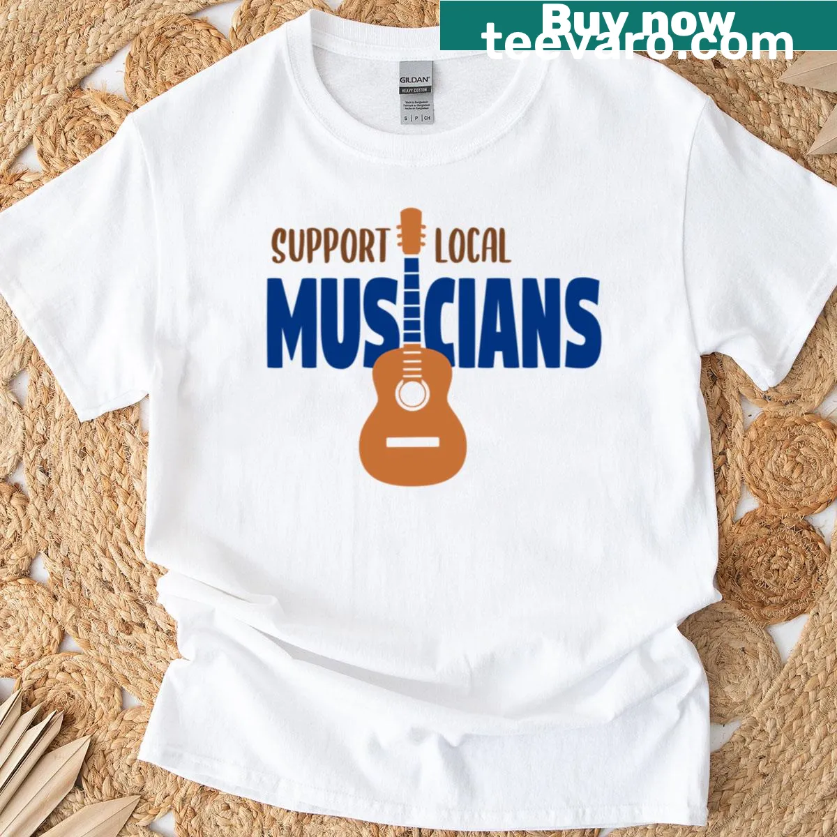 Bold typography advocating support for local musicians on a t-shirt — on a men's t-shirt