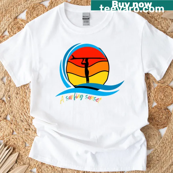 Illustration of surfers against a sunset backdrop on T-shirt