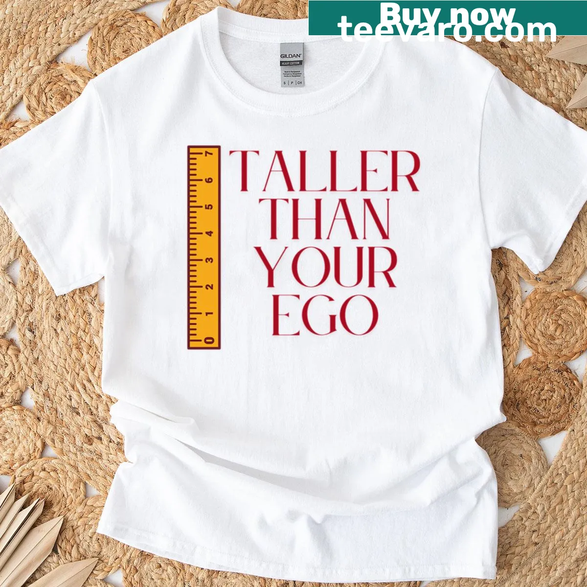 Funny t-shirt with 'Taller Than Your Ego' text — on a men's t-shirt