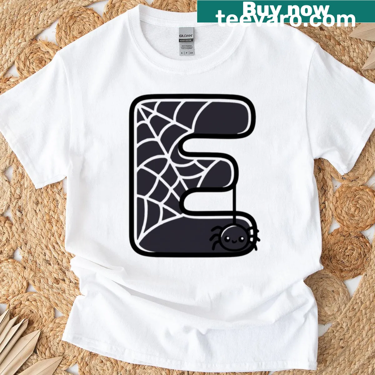 Kawaii cartoon Halloween letter E with spider web T-shirt — on a men's t-shirt