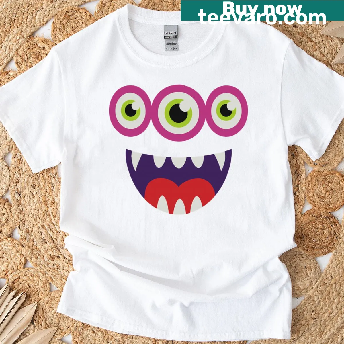 Cartoon T-shirt with a funny three-eyed monster design for kids — on a men's t-shirt