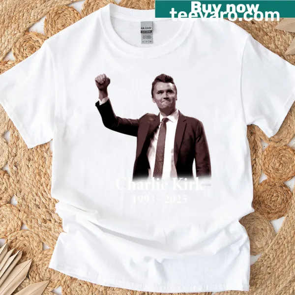 Oversized T-shirt with 'Rest In Peace Charlie Kirk 1993-2025' text.