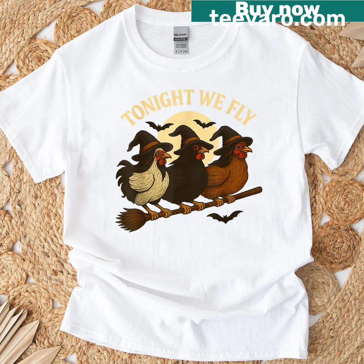 Cartoon chicken witches flying in the night sky with a humorous text graphic — on a men's t-shirt