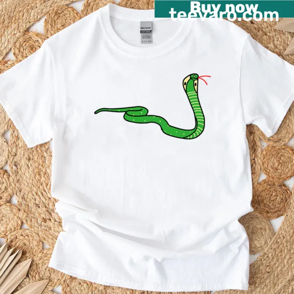 Hand-drawn cobra graphic on a shirt, showcasing intricate detail.