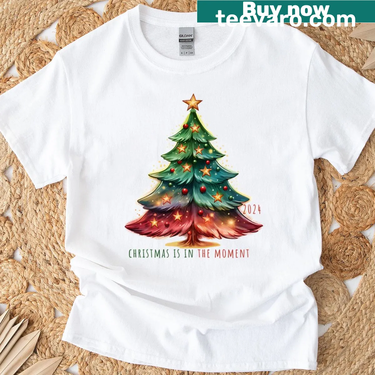 Typography t-shirt with the phrase 'Christmas Is In The Moment' — on a men's t-shirt