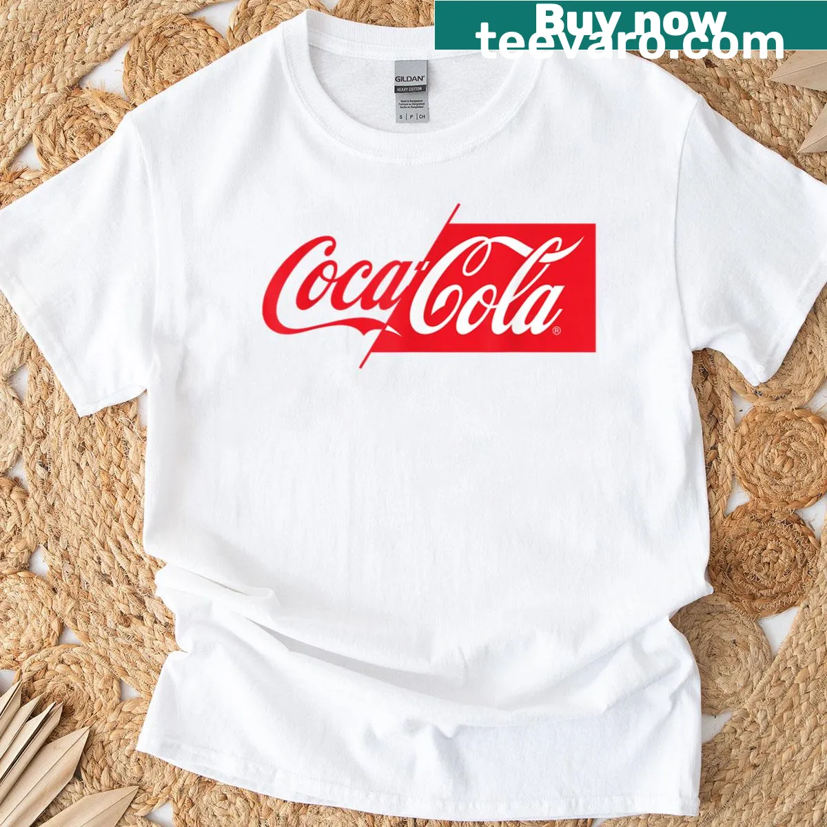 Coca Cola t-shirt with half red and half white logo design — on a men's t-shirt