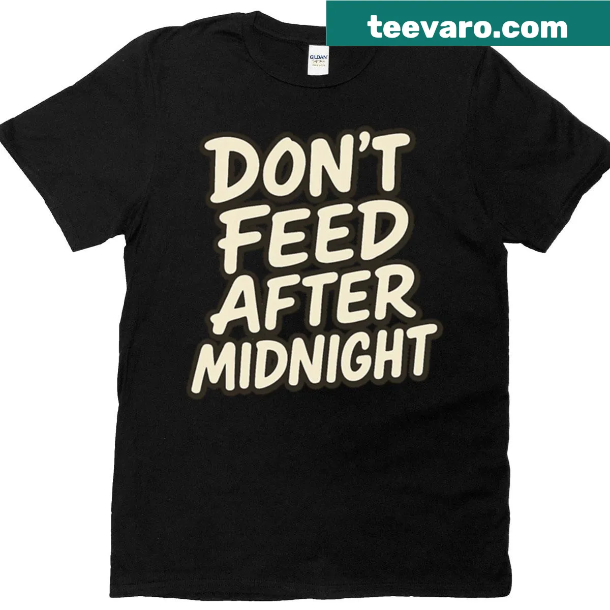 Graphic T-shirt with 'Dont Feed After Midnight' text design — on a men's t-shirt