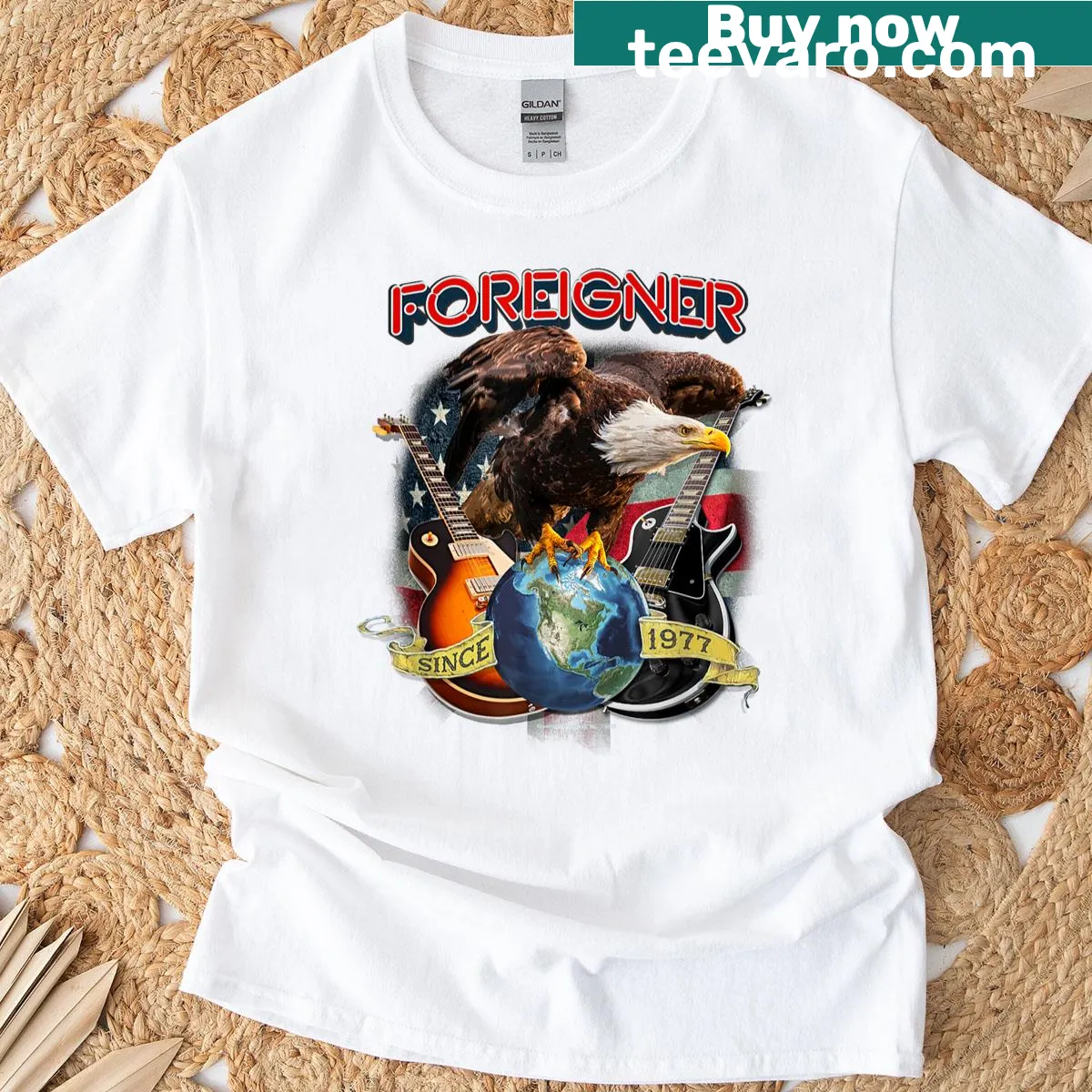 Americana eagle logo t-shirt with 'Foreigner Since 1977' text — on a men's t-shirt