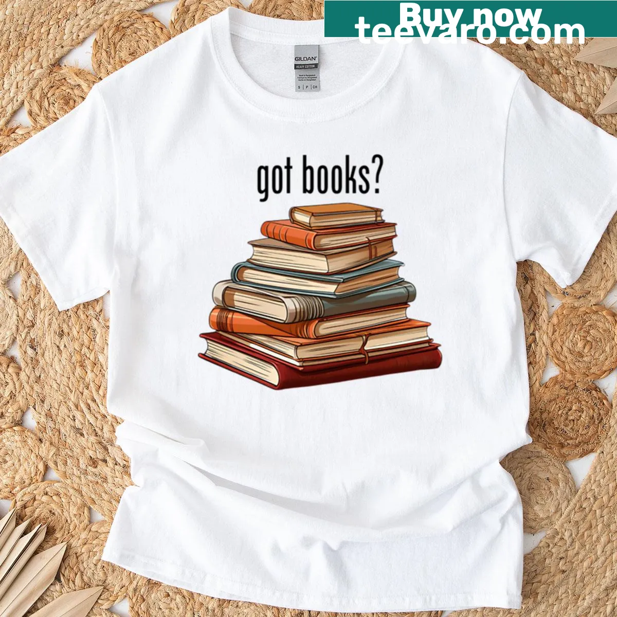 Typographic T-shirt featuring a stack of books — on a men's t-shirt