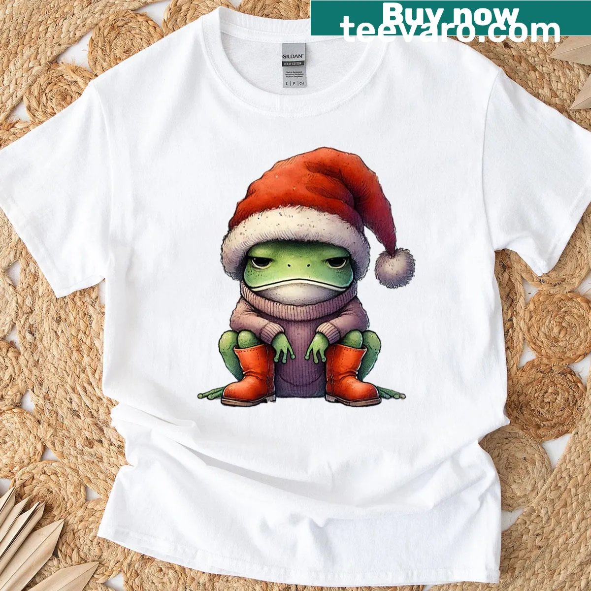 Cute Christmas t-shirt featuring a grumpy frog in cozy attire and boots — on a men's t-shirt