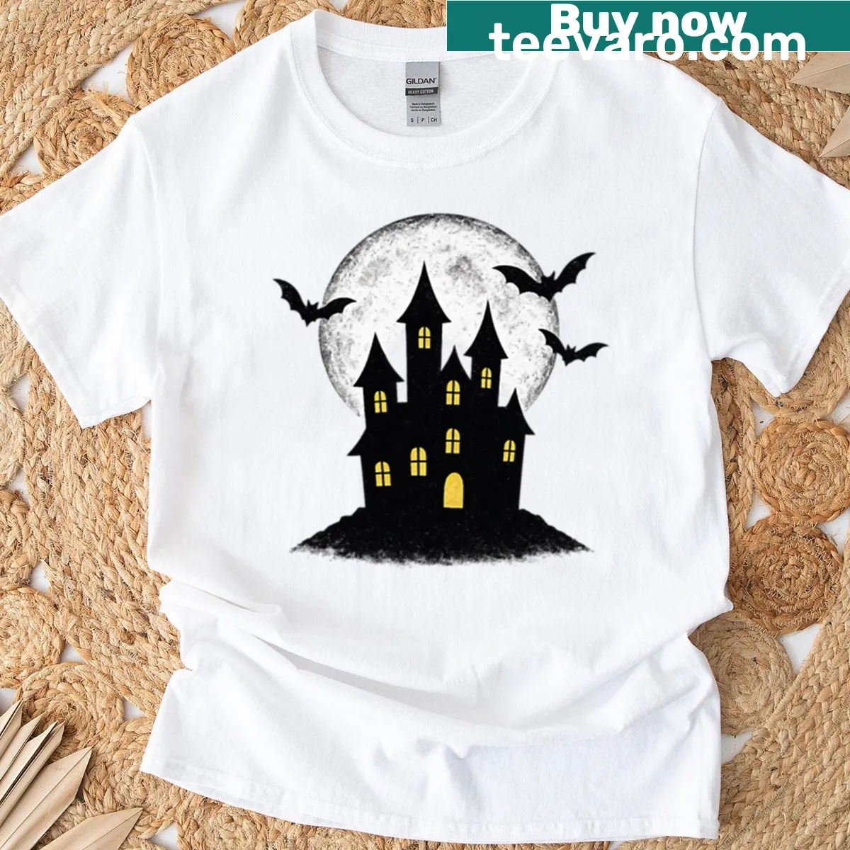 T-shirt with haunted house graphic under a spooky moon and bats — on a men's t-shirt