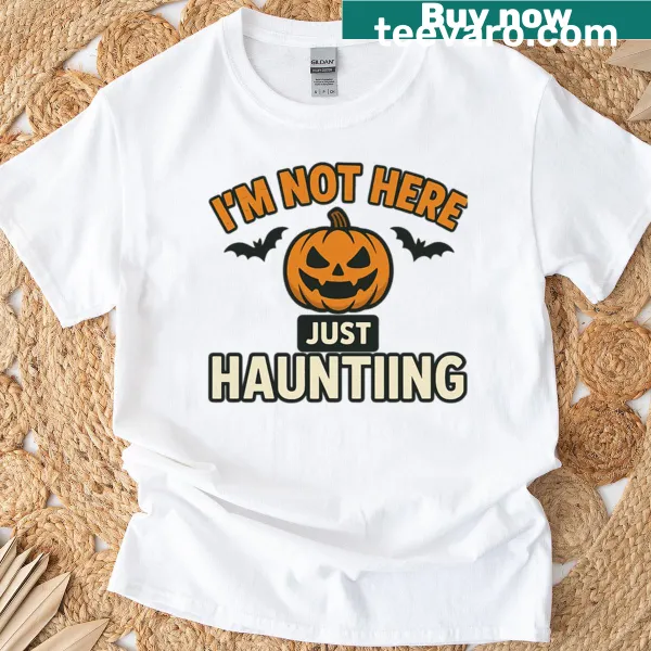 T-shirt with the phrase 'I'm Not Here Just Haunting' in bold typography