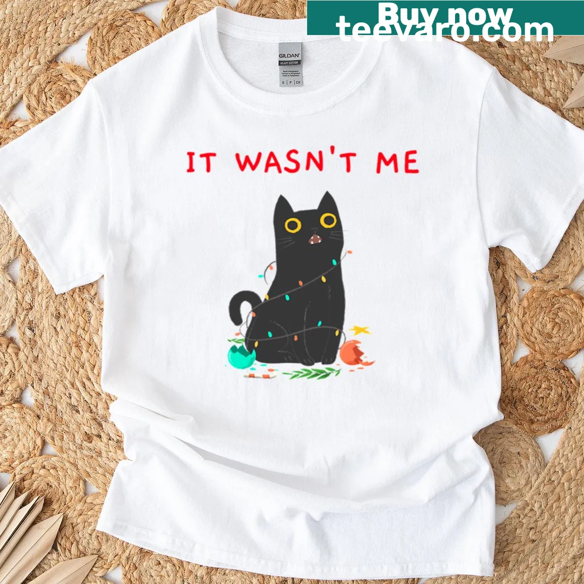Christmas t-shirt featuring a cat tangled in lights with the phrase 'It Wasn't Me' — on a men's t-shirt