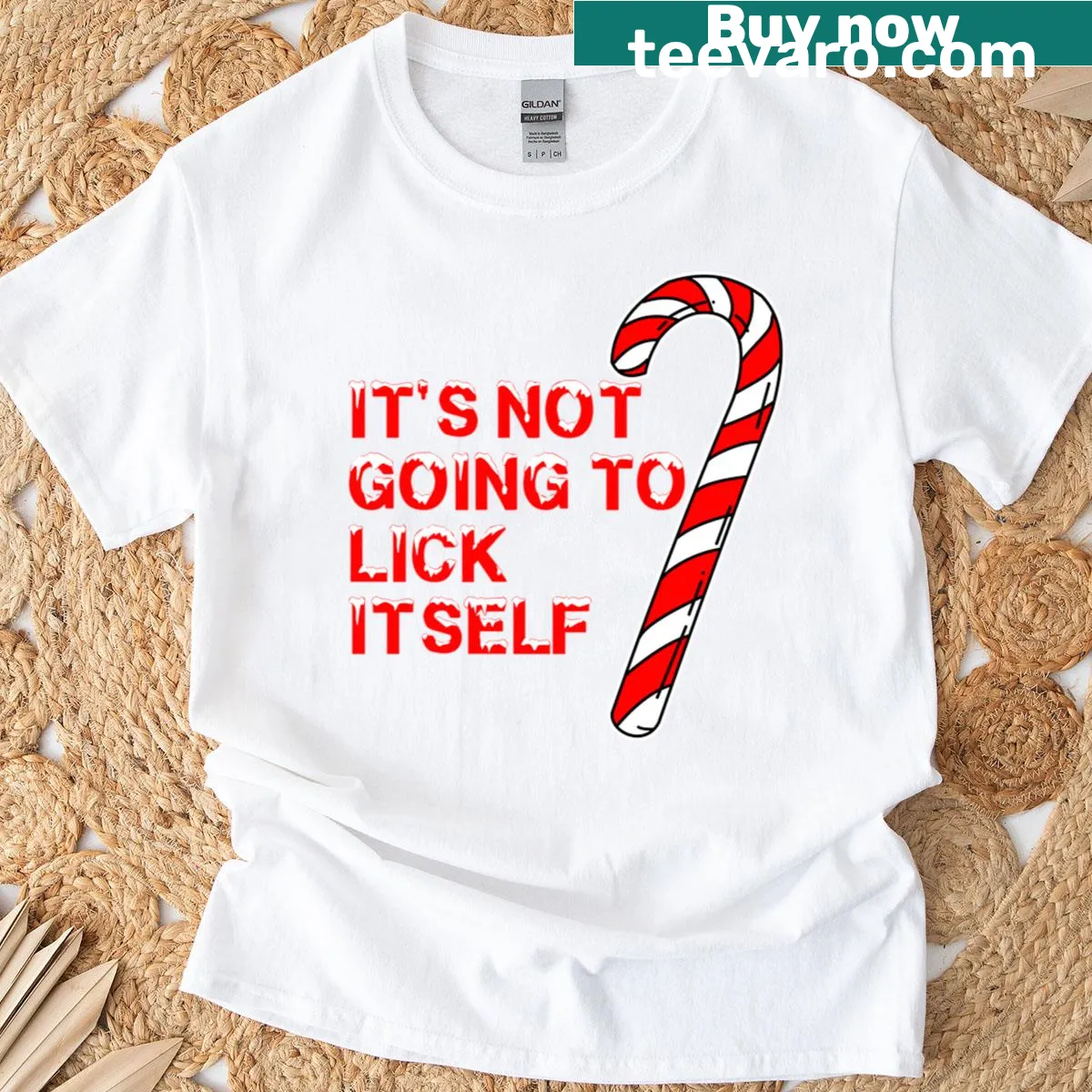 Funny Christmas t-shirt with the phrase 'It’s Not Going To Lick Itself.' — on a men's t-shirt