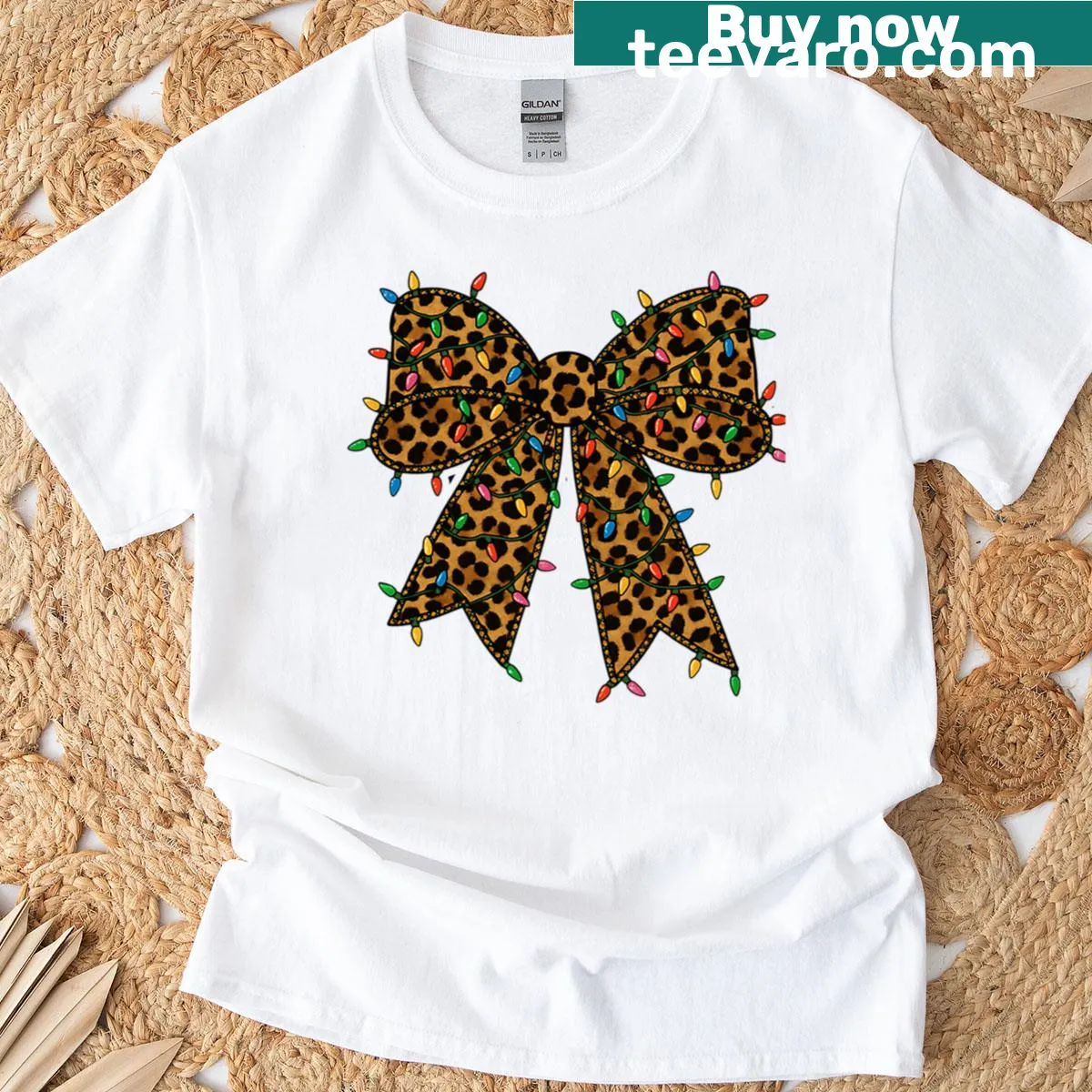 Leopard print holiday t-shirt with coquette bow and Christmas lights — on a men's t-shirt