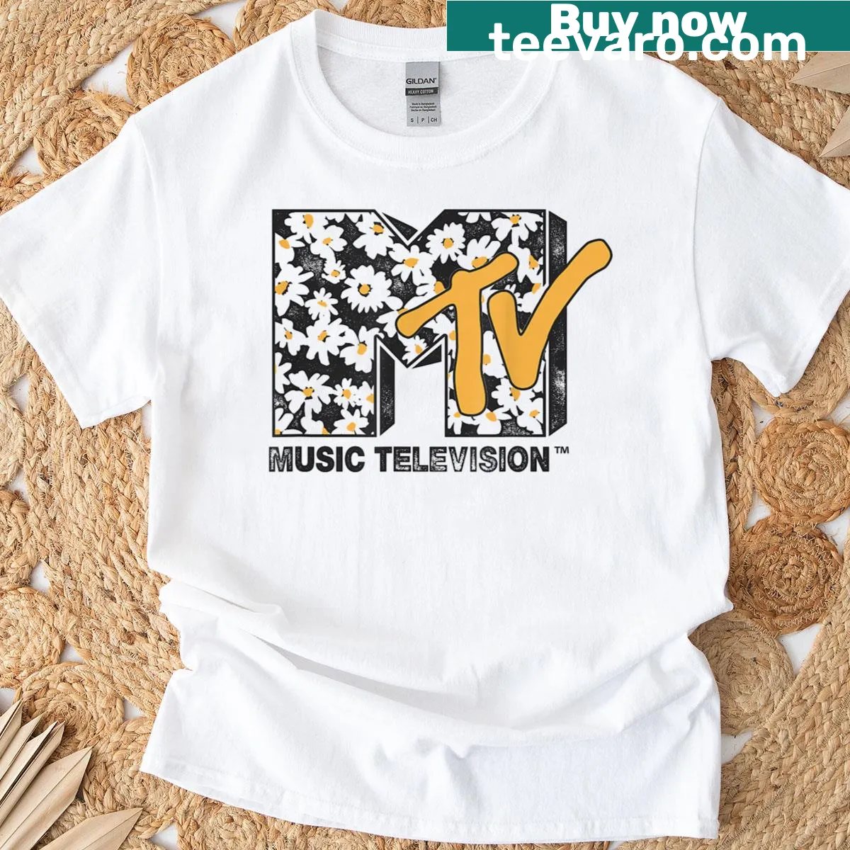 Distressed MTV logo t-shirt with daisies for music fans — on a men's t-shirt